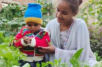 Mother and child in garden