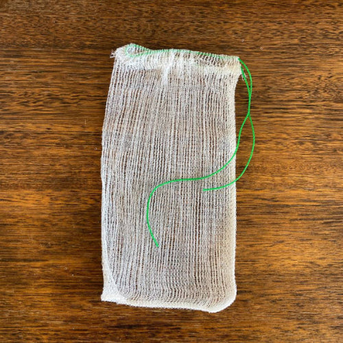 White mesh small fruit protection bag with drawstring