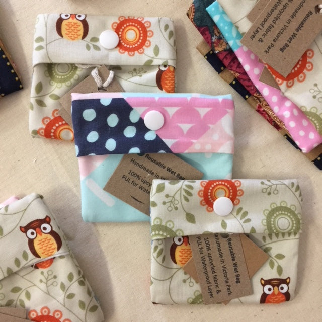 Collection of Colorful Reusable Wet Bags with Various Prints from PaulaW.