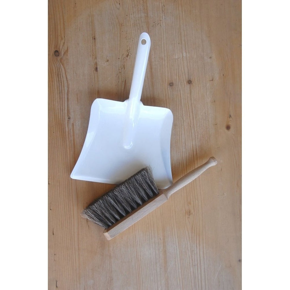 Children's Dustpan and Brush Set on Wooden Table