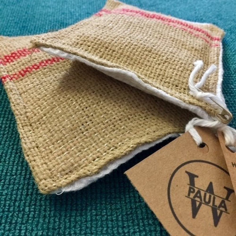 Handmade kitchen scourer sponge for cleaning made from recycled fabric.