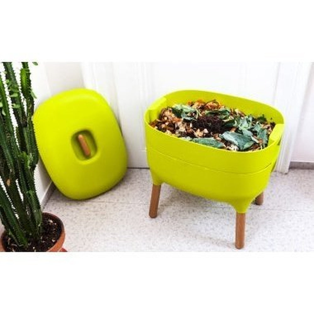 Urbalive Worm Farm in Green with Lid Off to Show Food Scraps in Worm Farm.