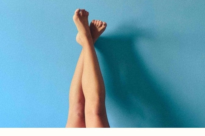 legs on blue background