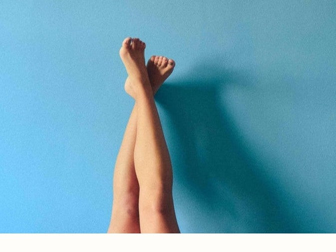 legs on blue background