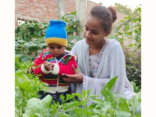 Mother and child in garden