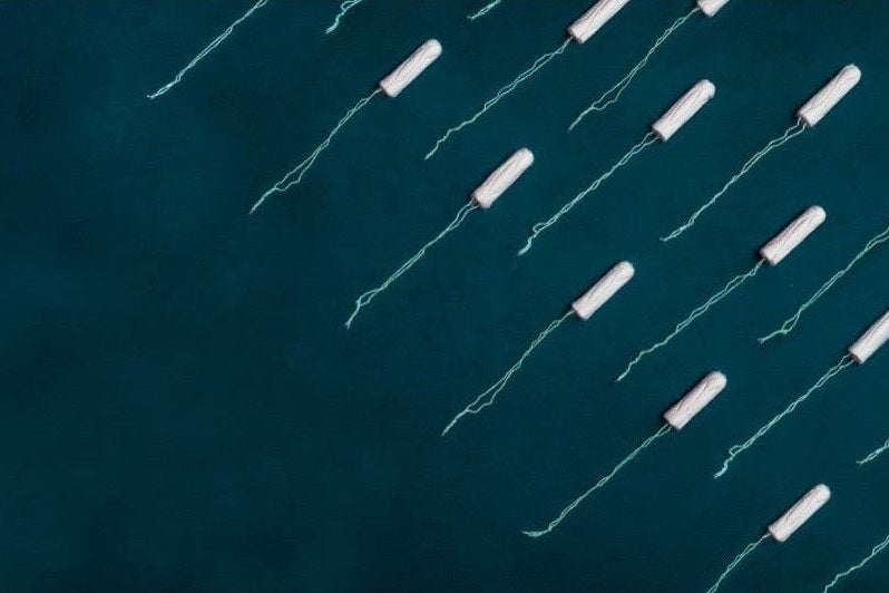 Tampons on dark background
