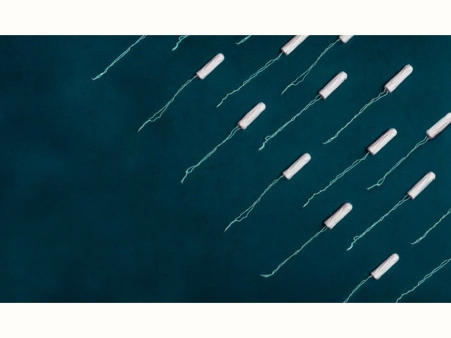 Tampons on dark background