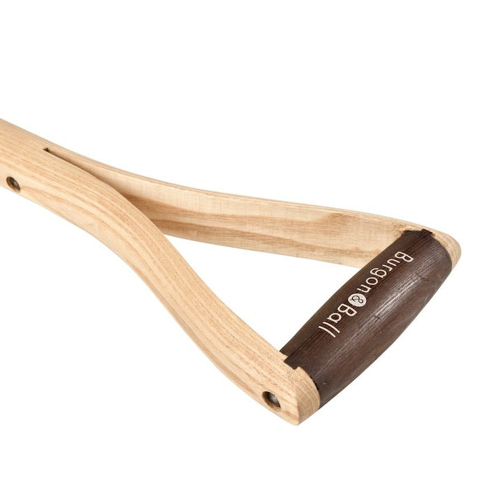 Wooden garden fork with brown handle on a white background