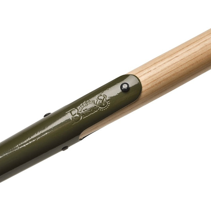 Close-up of a green metal rod with a wooden handle, featuring the brand 'Burgon & Ball'.