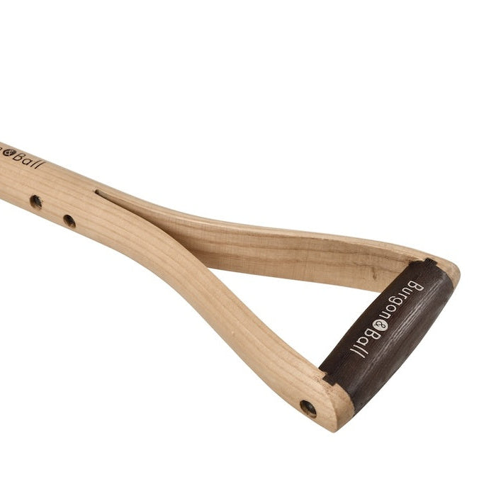 Wooden snow shovel with black handle on a white background