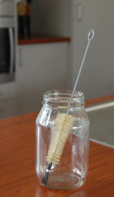 Black Tipped Conical Bottle Brush in Glass Jar, Urban Revolution.