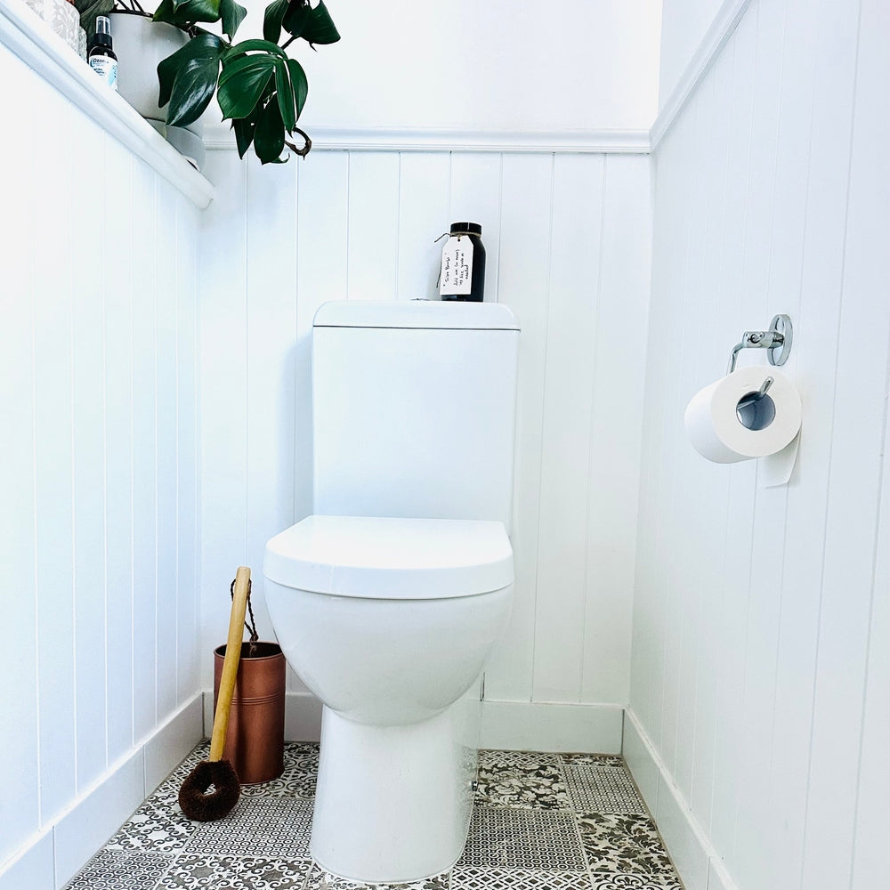 Eco Max Toilet Brush and Copper Toilet Brush Holder in Bathroom.