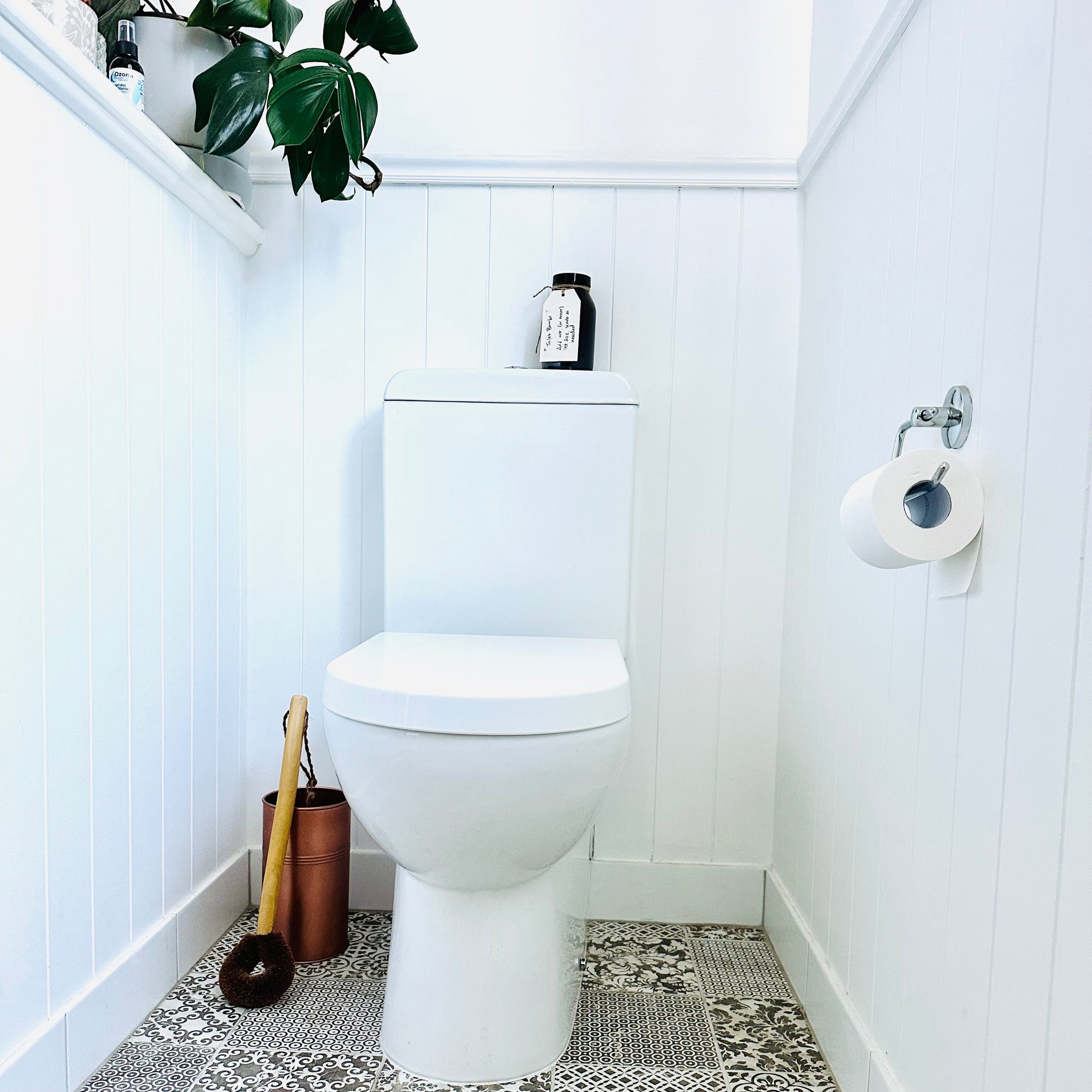 Eco Max Toilet Brush and Copper Toilet Brush Holder in Bathroom.