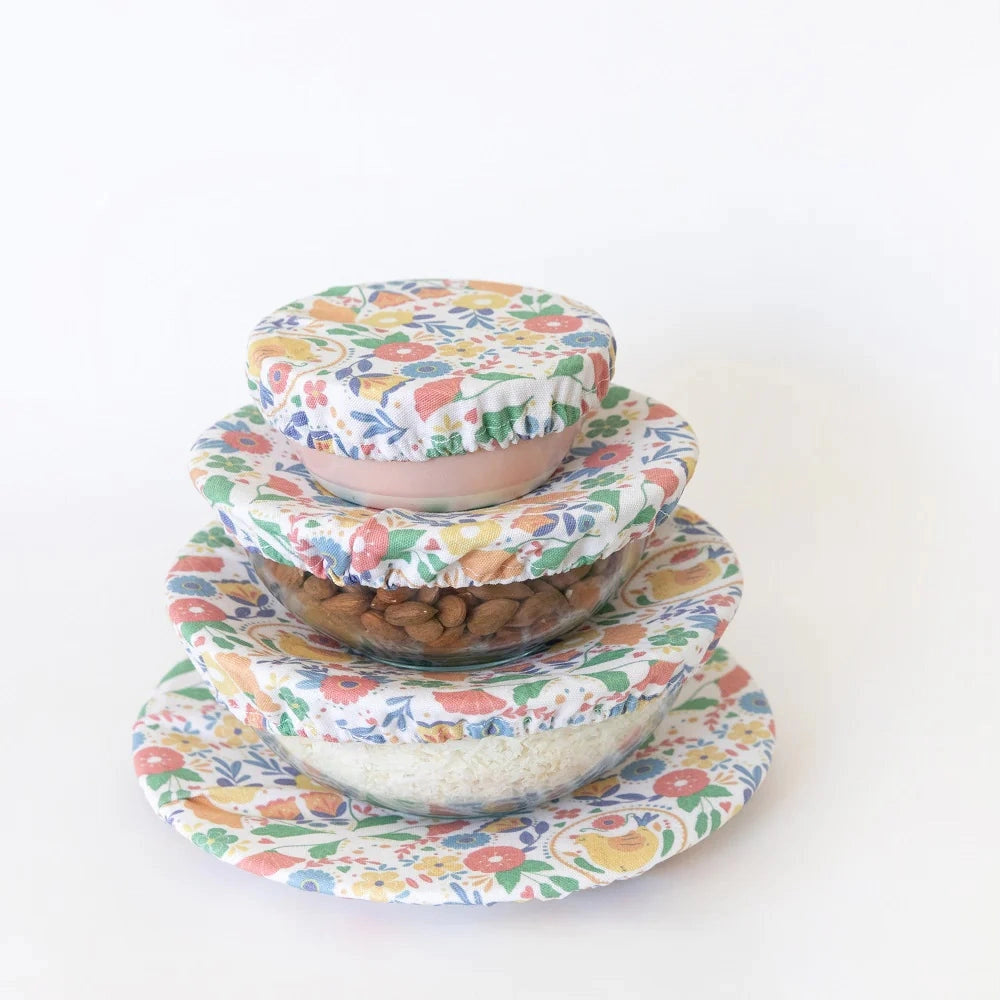 Stacked Glass Bowls Covered With Reusable Cotton Food Covers.