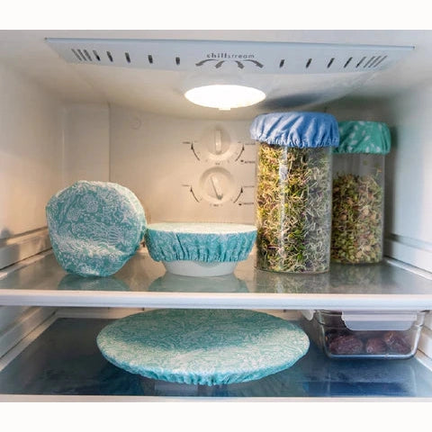 Various Containers in Fridge Covered with Cotton Food Covers