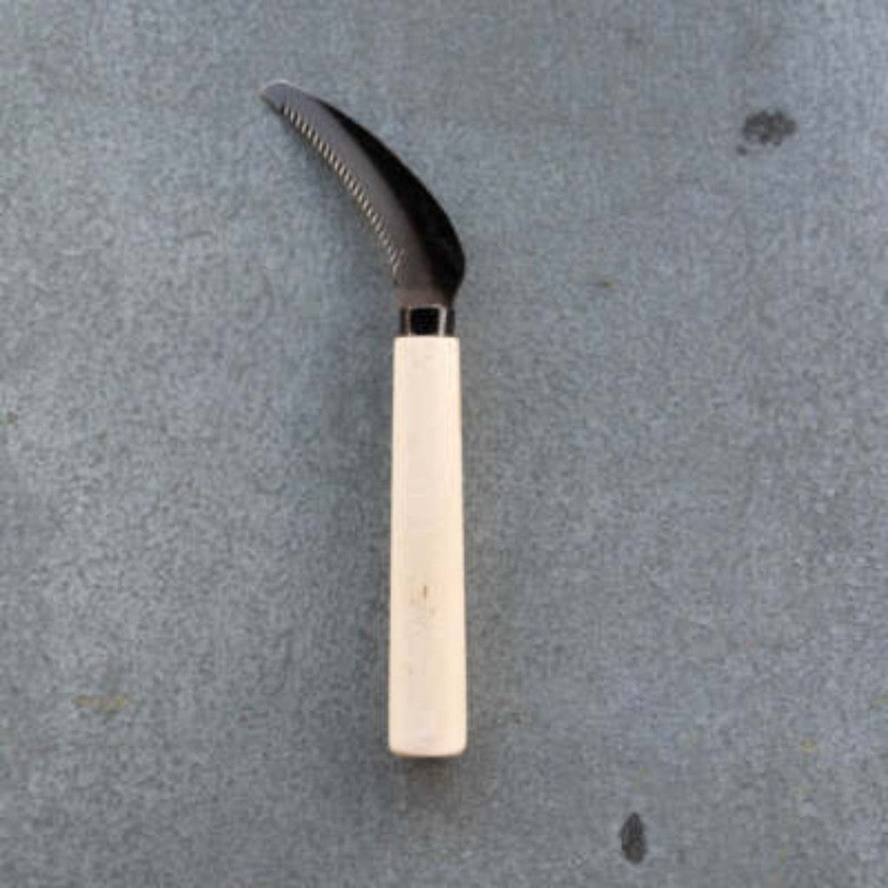 Grafting knife with a wooden handle on a gray background