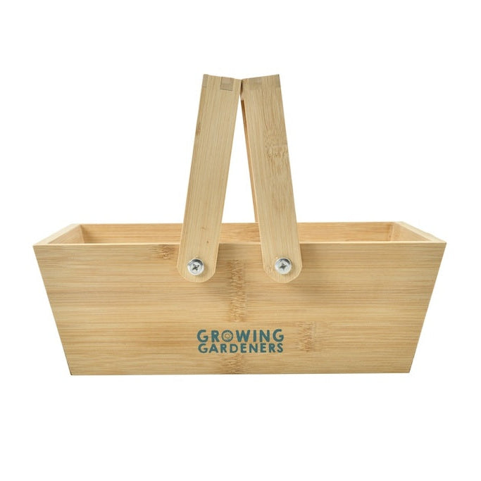 Wooden gardening caddy with 'Growing Gardeners' branding on a white background