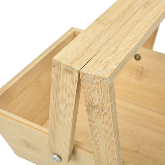 Close-up of a wooden basket with a handle on a white background