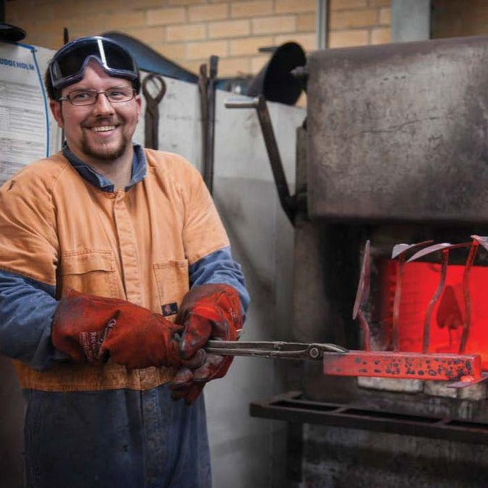 James - FD Ryan Tool Maker Holding Hand Forged Tools.