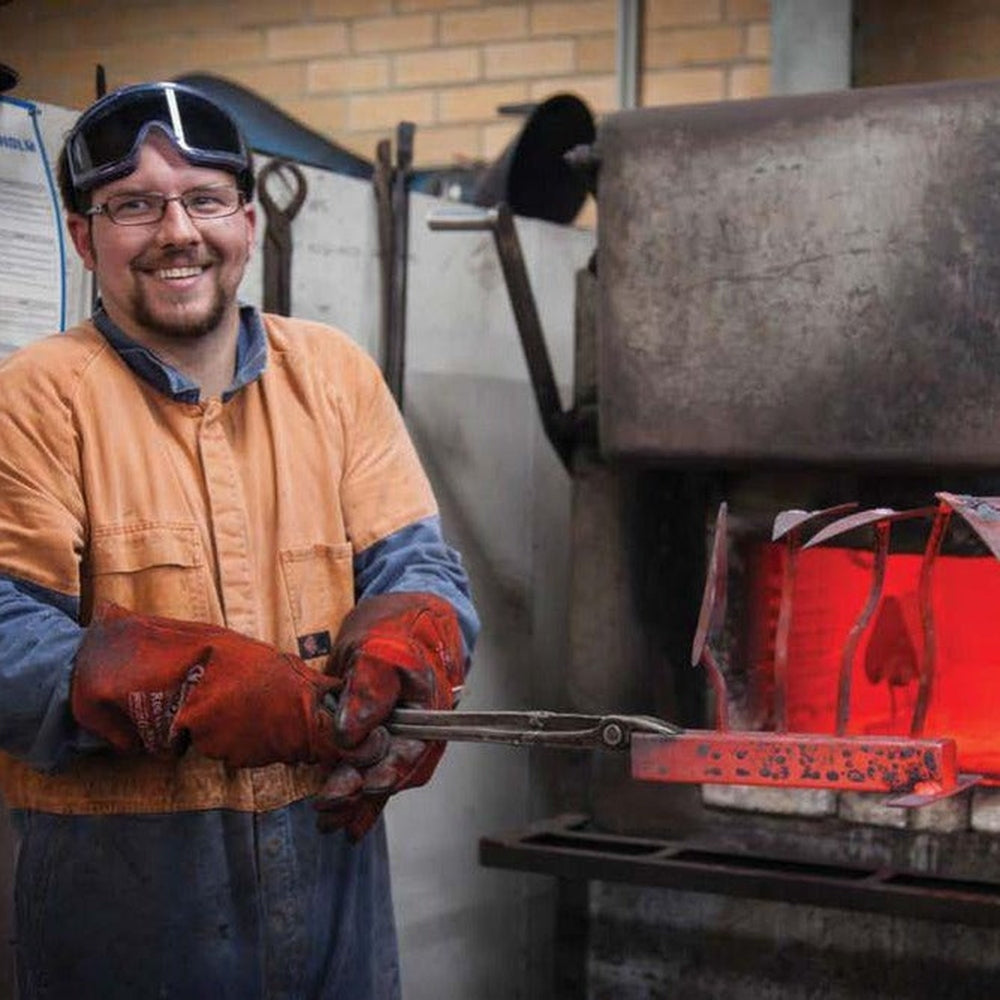 James - FD Ryan Tool Maker Holding Hand Forged Tools.