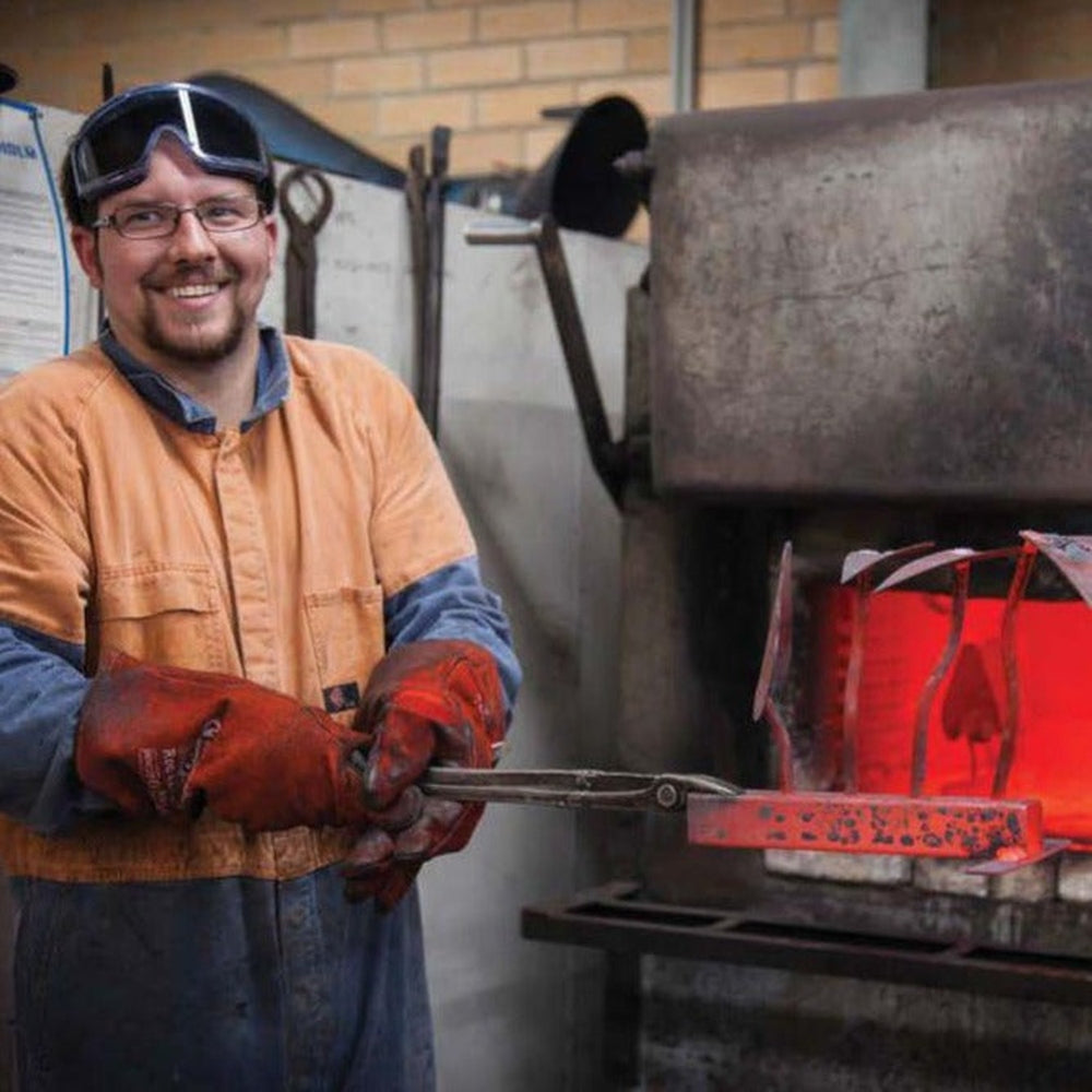James - FD Ryan Tool Maker Holding Hand Forged Tools.