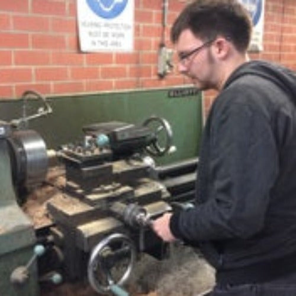 Tool Maker James Turning Wooden Handles.