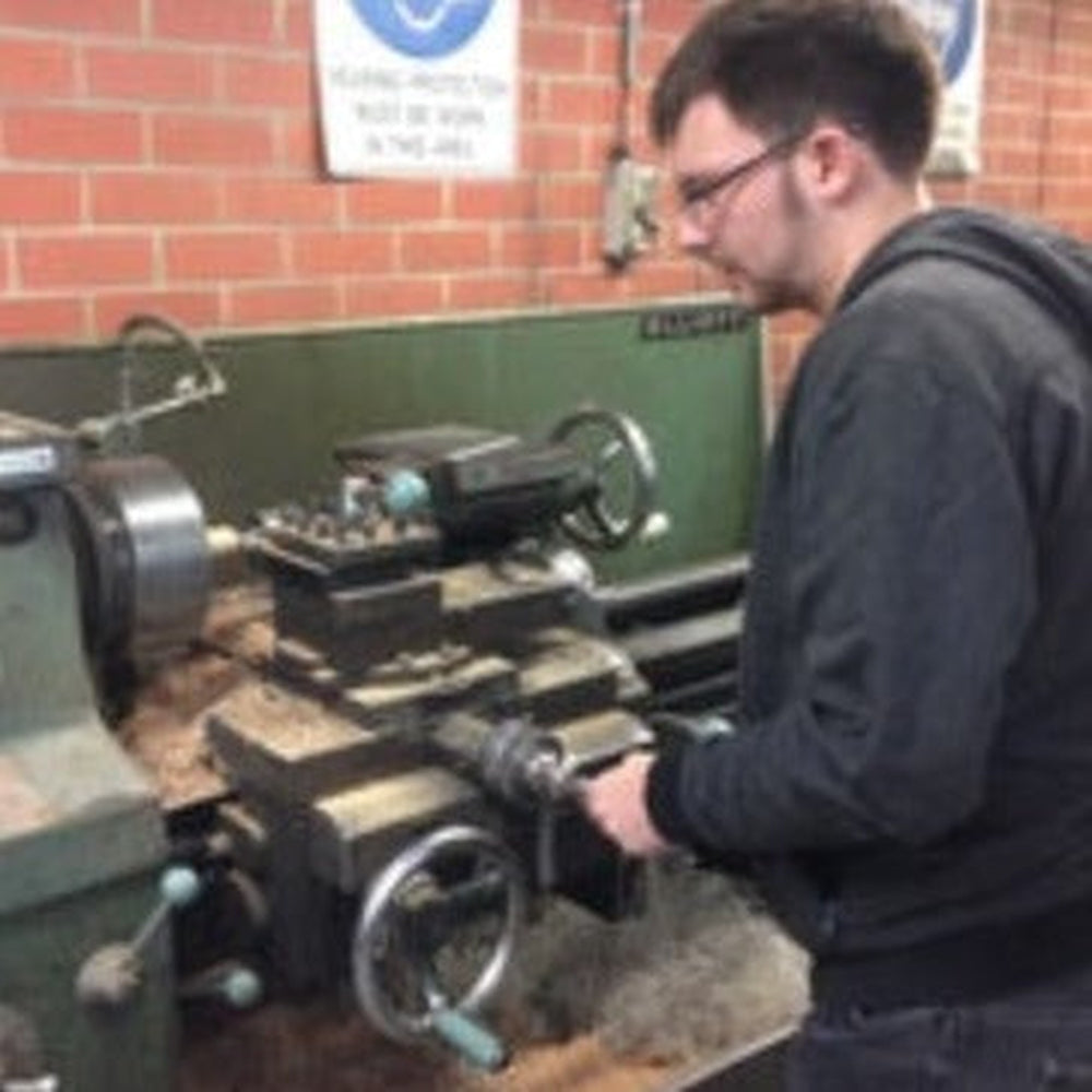 Tool Maker James Turning Wooden Handles.