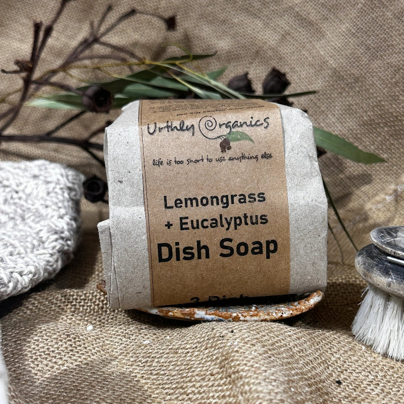 3 Pack of Lemon and Eucalyptus Dish Soap Wrapped in Brown Paper on Natural Background.