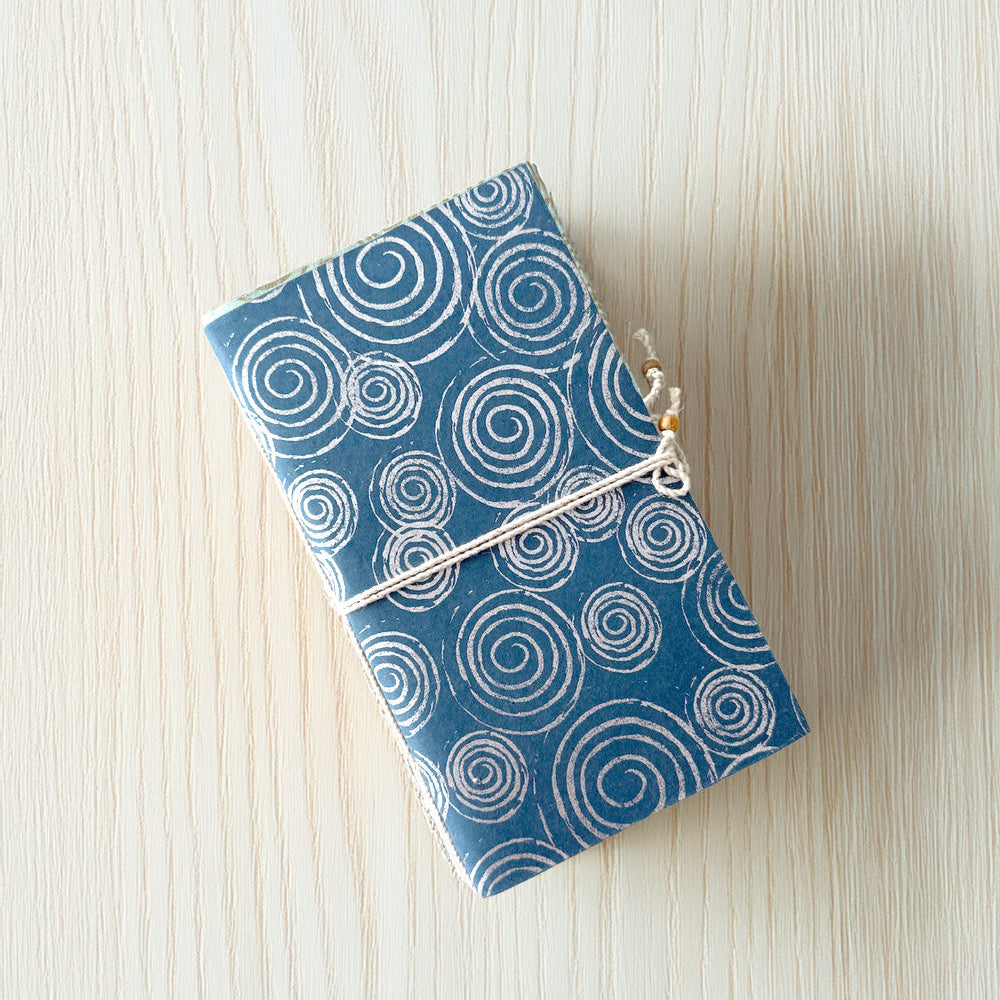 Fair Trade Handcrafted Notebook with Blue Fabric Cover with White Swirl Pattern with Twine Binder.