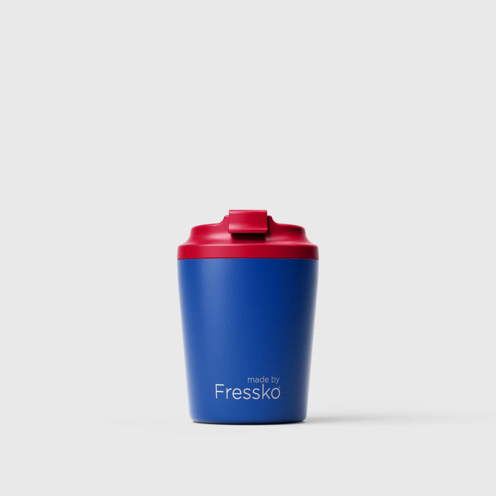 The 'Piccolo' "Zing" Ceramic Lined 4oz Insulated Coffee Cup in Oat, by Fressko. Featuring a Blue Insulated Cup with a Red Lid.