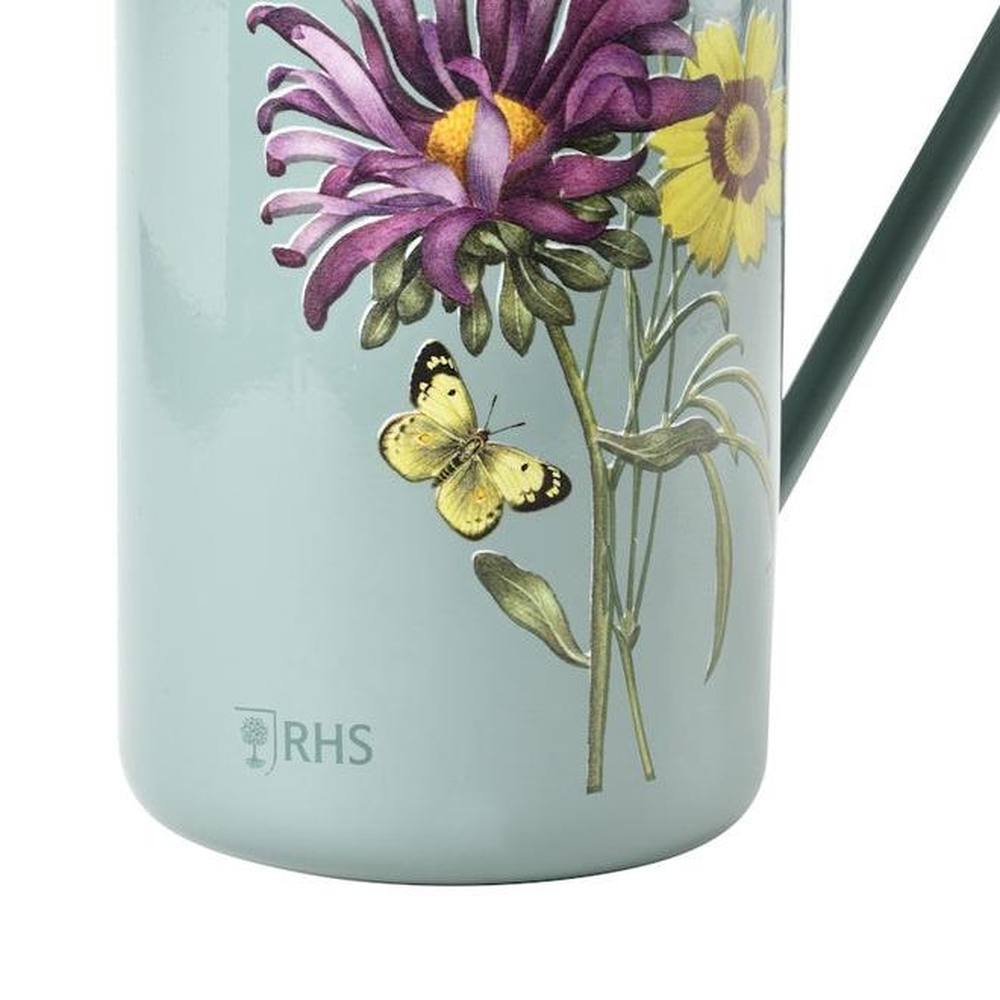 Indoor watering can featuring historic botanical illustrations.