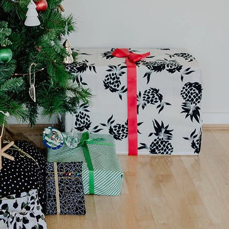 Fabric Wrapped Presents Under Xmas Tree.