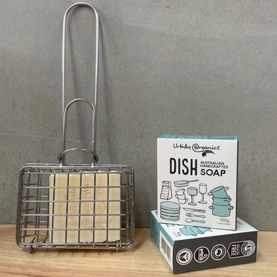 A stainless steel wire dish soap basket holding a bar of soap, shown next to a box of Dish Soap.