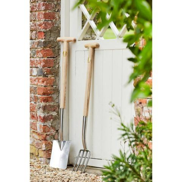 Sophie Conran Garden Fork with Wooden T-Handle and Stainless Steel Head - Shown in Garden with Sophie Conran Digging Spade.