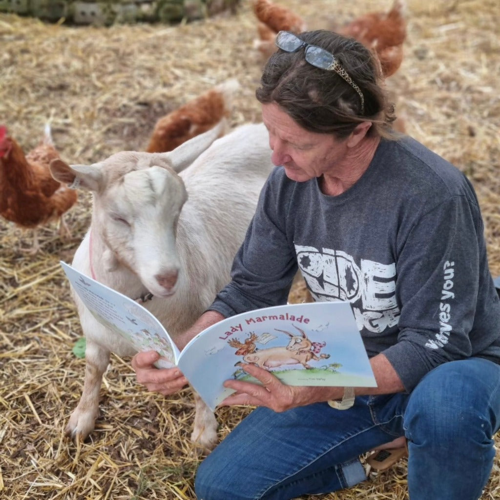 Tim Darby, Illustrator of Lady Marmalade Reading to Goat.