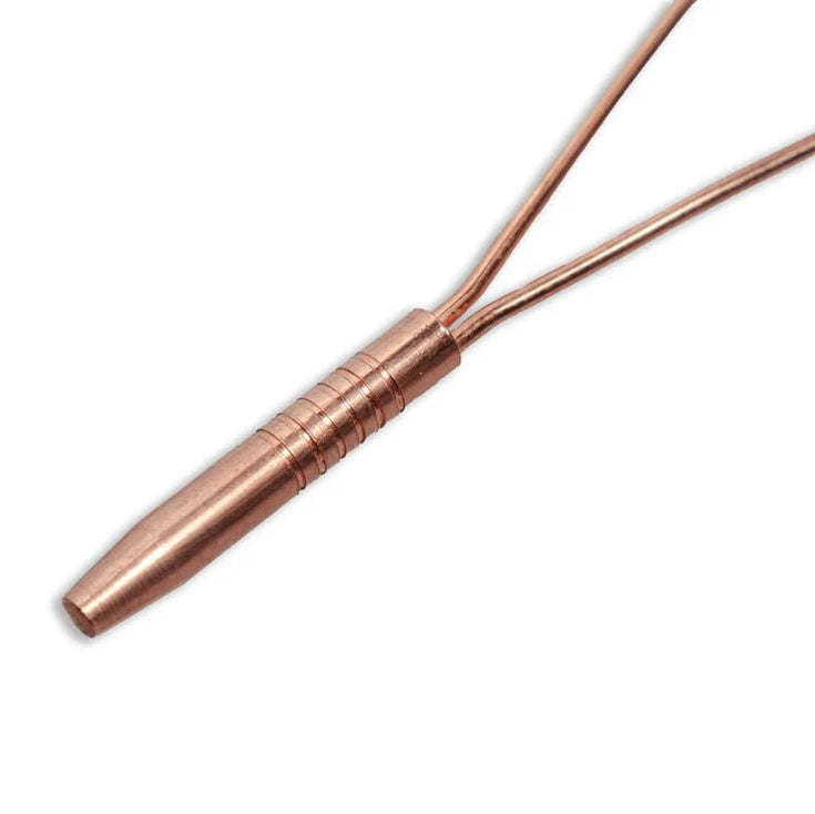 Close up of the single handle of a copper tongue cleaner on a white background.