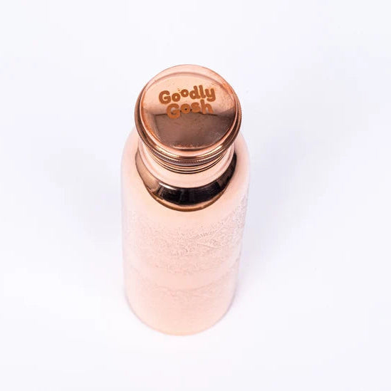 A pure copper water bottle with a textured body and a copper lid engraved with the brand name 'Goodly Gosh', shown on a plain white background.
