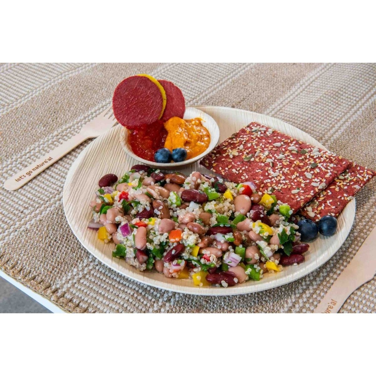 Round eco friendly party plate with salad