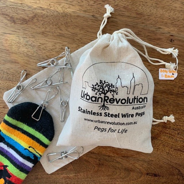 A Bag of Urban Revolution&#39;s All-Rounder Stainless Steel Pegs in Grade 304 (1.8mm), Showing Loose Pegs and a Sock