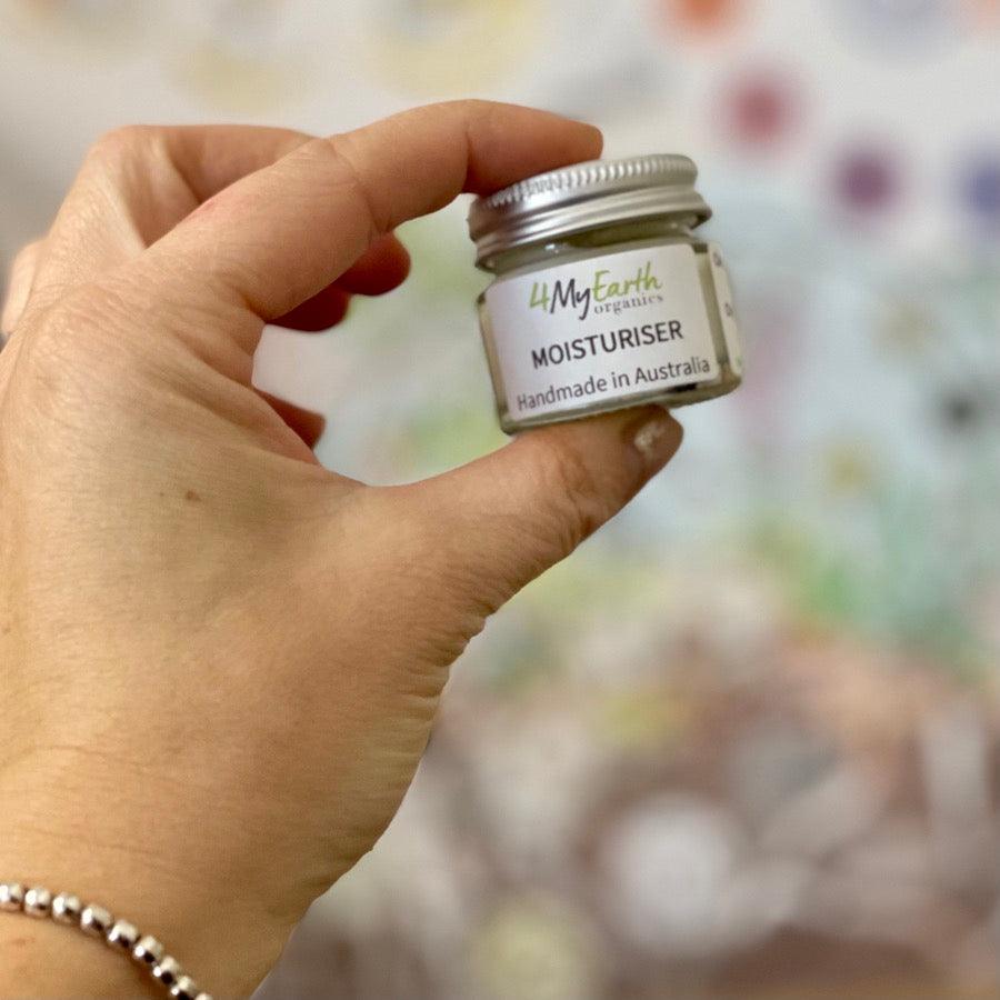 handmade moisturiser in small glass jar