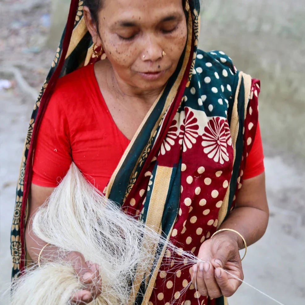 Bangladeshi Woman with Hemp Fibres Being Made Into Twine.