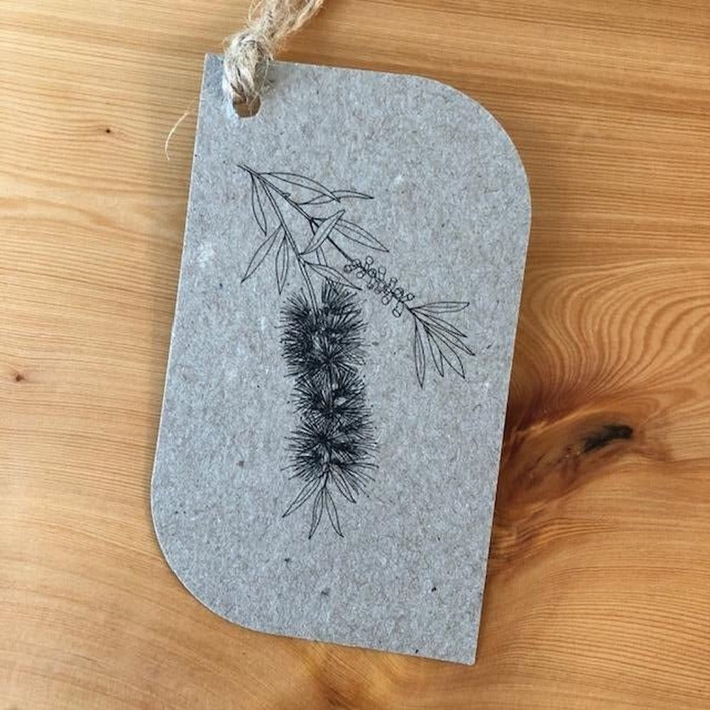 A Carbon Offset Gift Tag from Carbon Positive Australia in the Bottlebrush Design