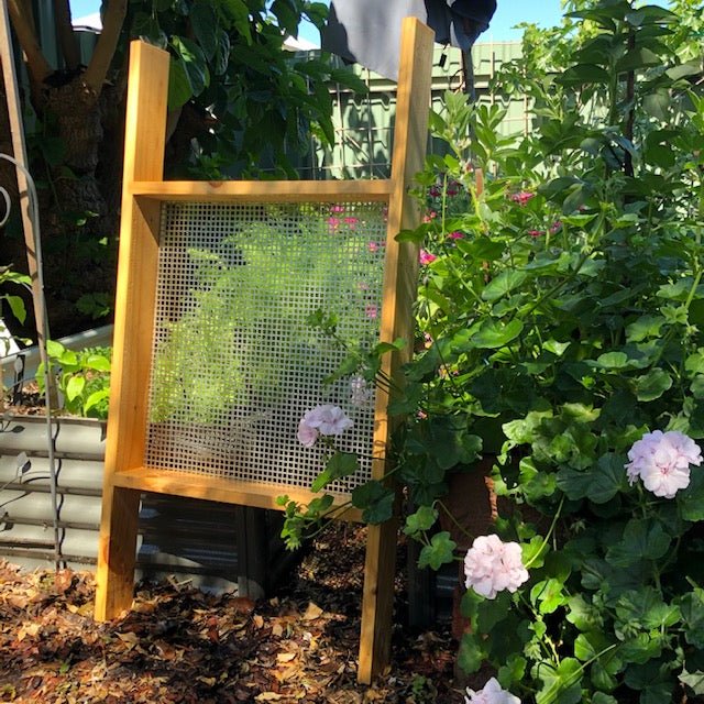 The Compost Sieve for Wheelbarrows, Standing Upright in a Garden