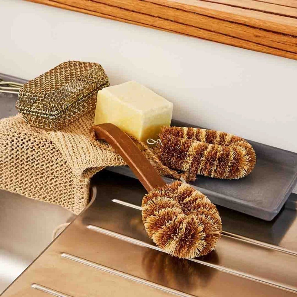 The Premium Dish Brush from Eco Max on a Draining Board
