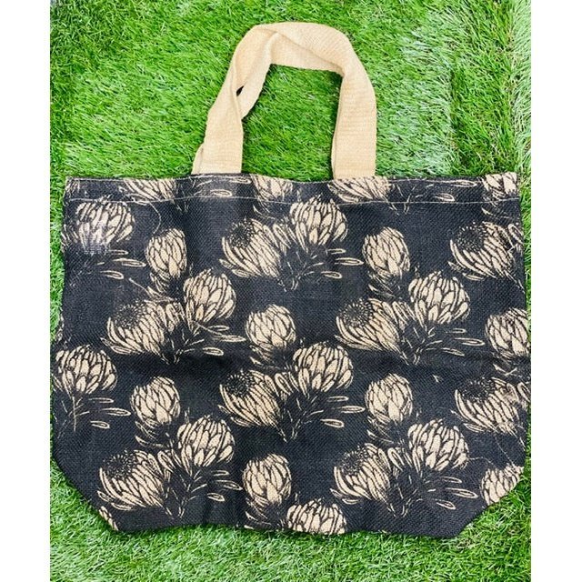 The Grocer Bag - 100% Jute Charcoal Field Protea Design