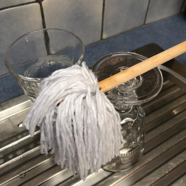 Cotton Dish Mop, from Heaven in Earth, Resting on a Glass