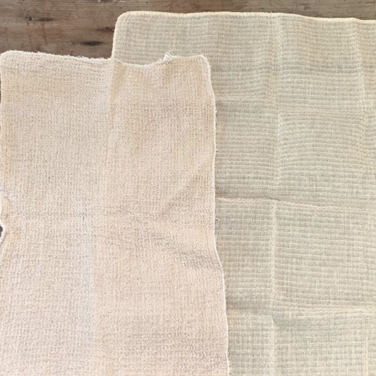 Unbleached Cotton Cleaning Cloth - Cloth on the Left after Washing