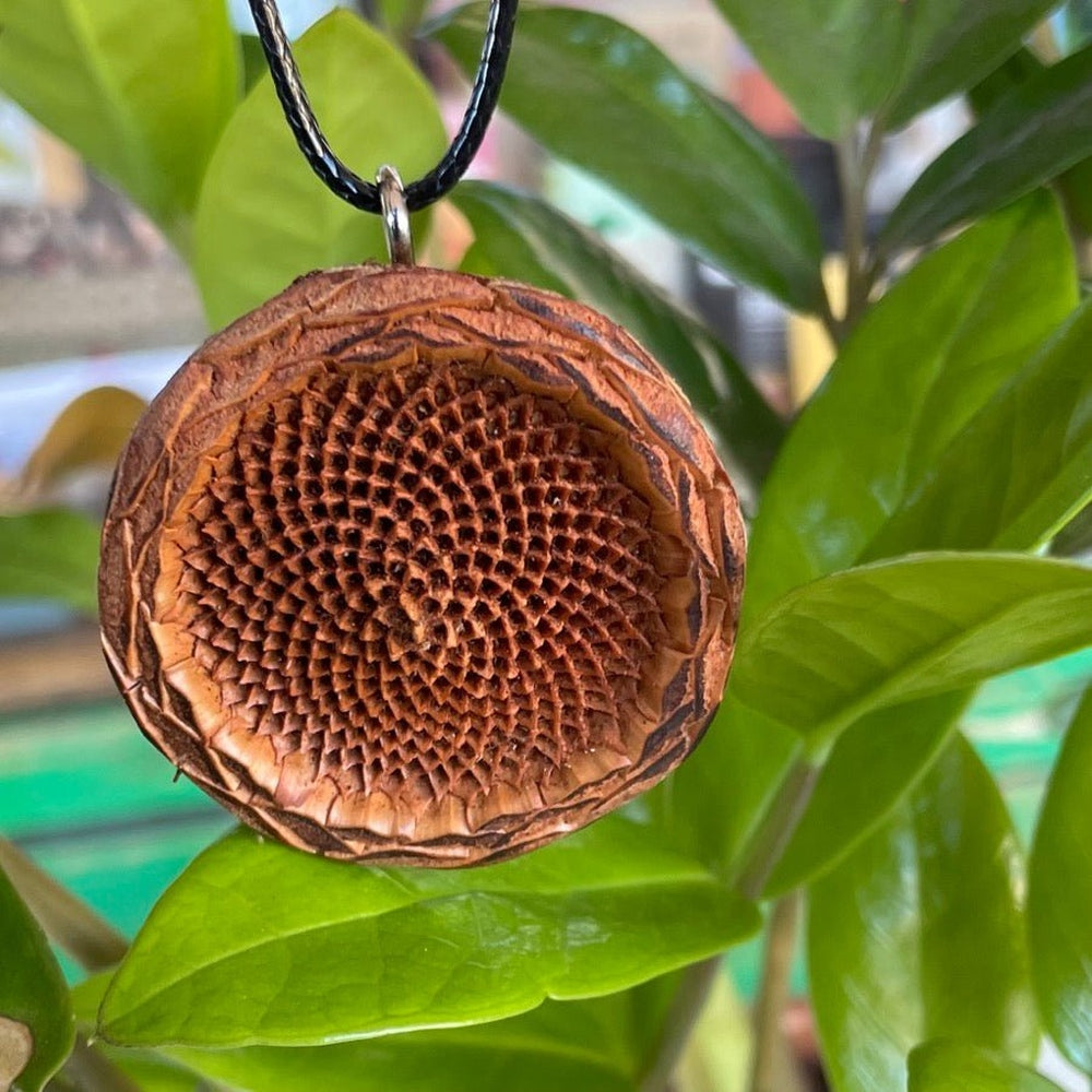 Necklace made with foraged seedpod and leather cord