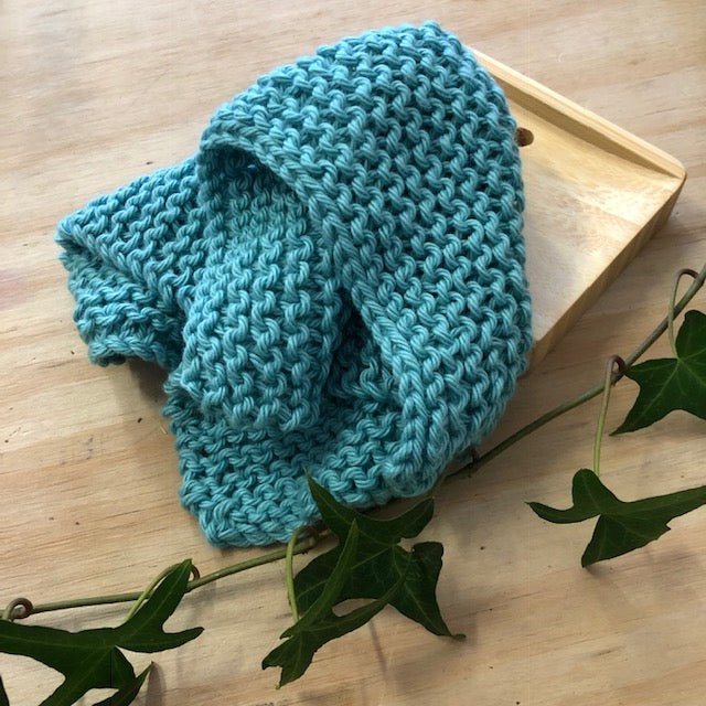 Hand made knitted face cloth made by PaulaW. Colour aqua.