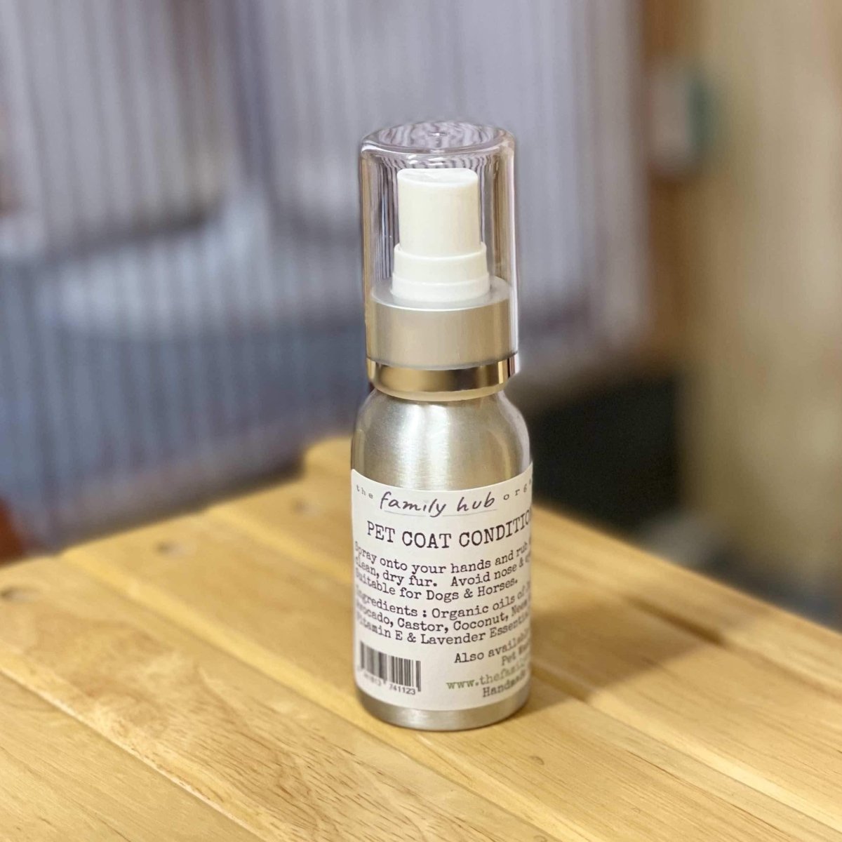 pet coat conditioner in small bottle on bench